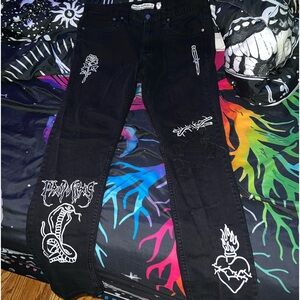 Broken promises snake skinny jeans
